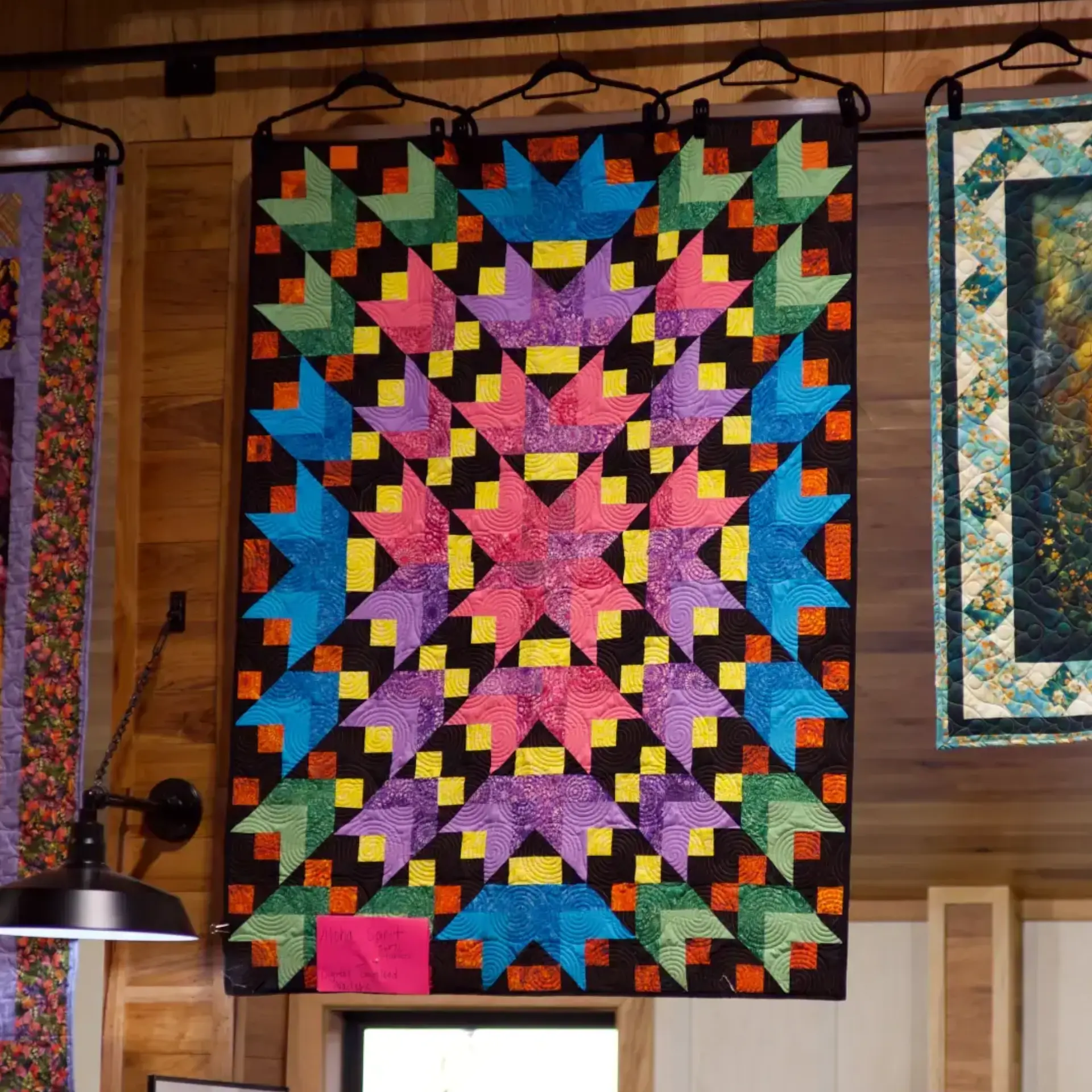 A quilt made from a Mystery Five-0 pattern